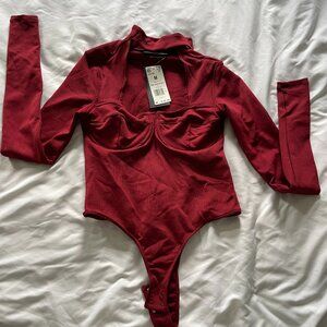 NWT Reebok x Cardi B Thong Bodysuit Ribbed Long Sleeve Burgundy Womens M